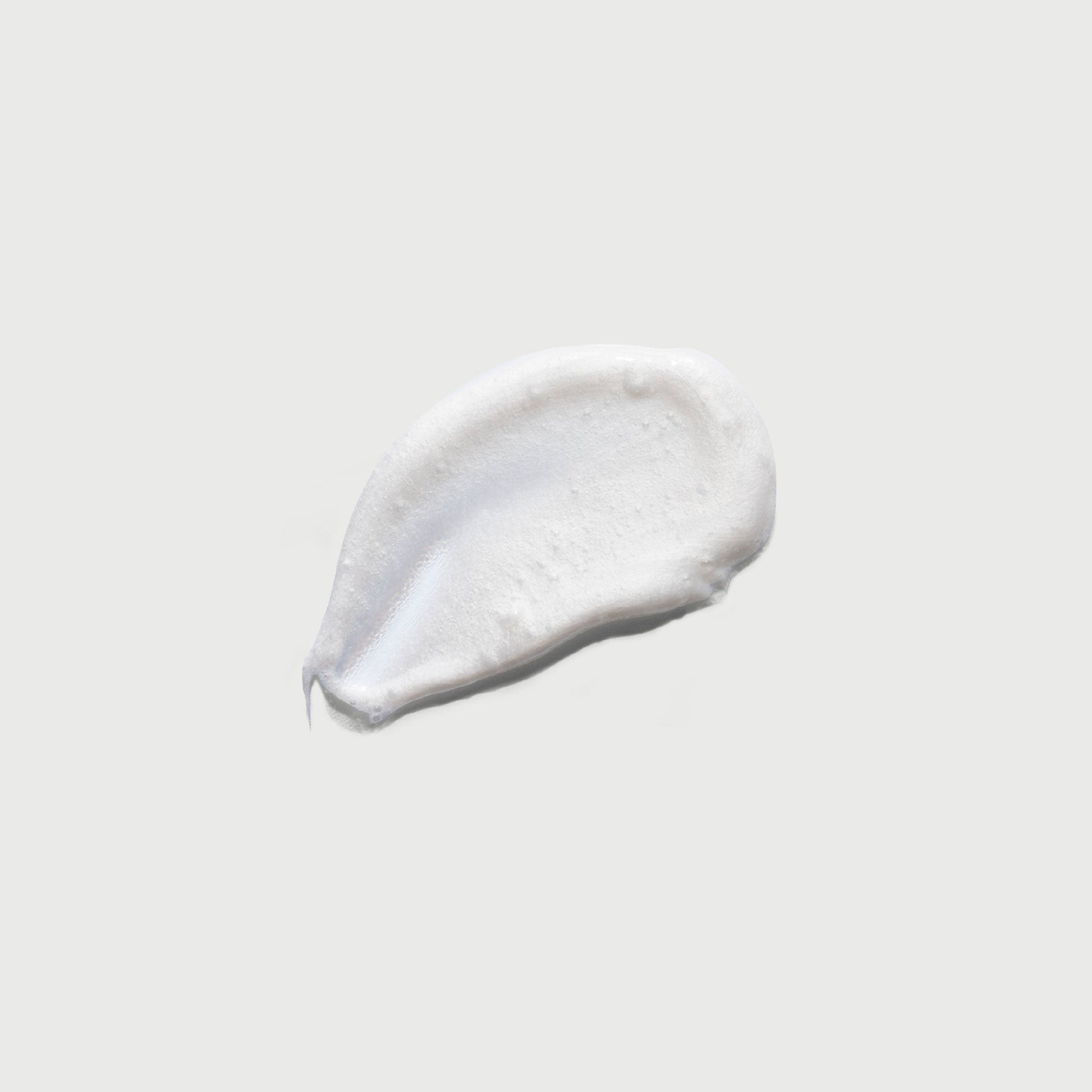 the-smoother-glycolic-acid-exfoliating-body-wash-o2 NATR-40002-Swatch-The-Smoother-Glycolic-Acid-Exfoliating-Body-Wash-bonebkgd.jpg