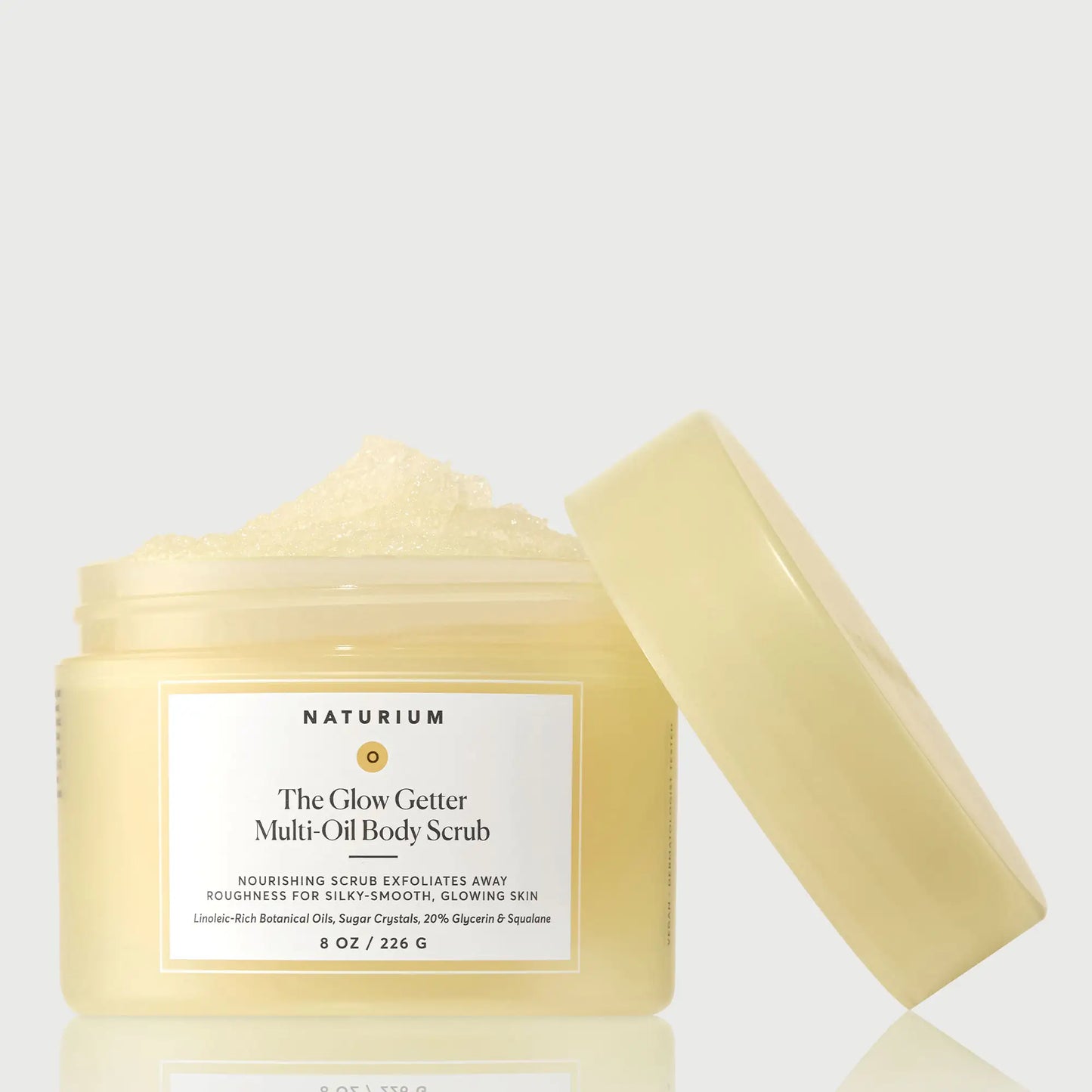 the-glow-getter-multi-oil-body-scrub-q1 NATR-40028-GlowGetter-Multi-Oil-Body-Scrub-Front-CapOff-bonebkgd.webp