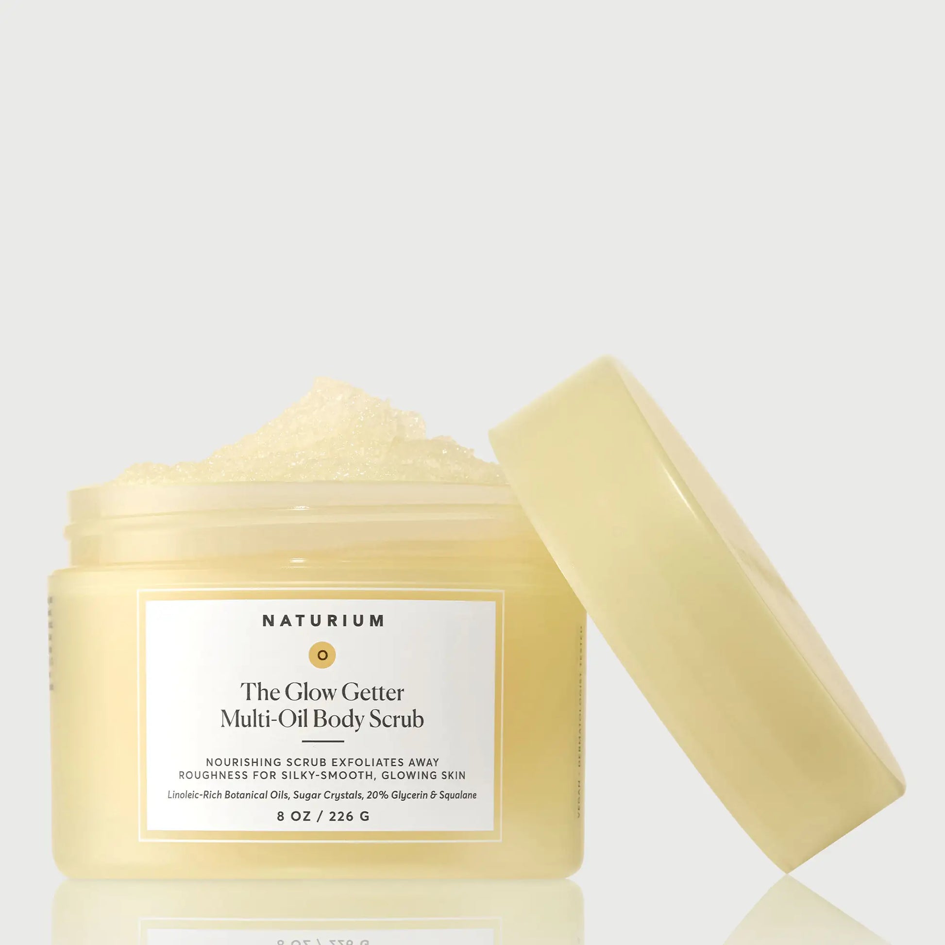 the-glow-getter-multi-oil-body-scrub-q1 NATR-40028-GlowGetter-Multi-Oil-Body-Scrub-Front-CapOff-bonebkgd.webp