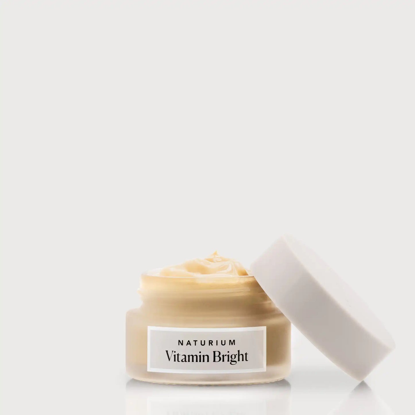 vitamin-bright-illuminating-eye-cream-r3 NATR-VitaminBright_LIGHT_Primary_front_openjar_bone.webp