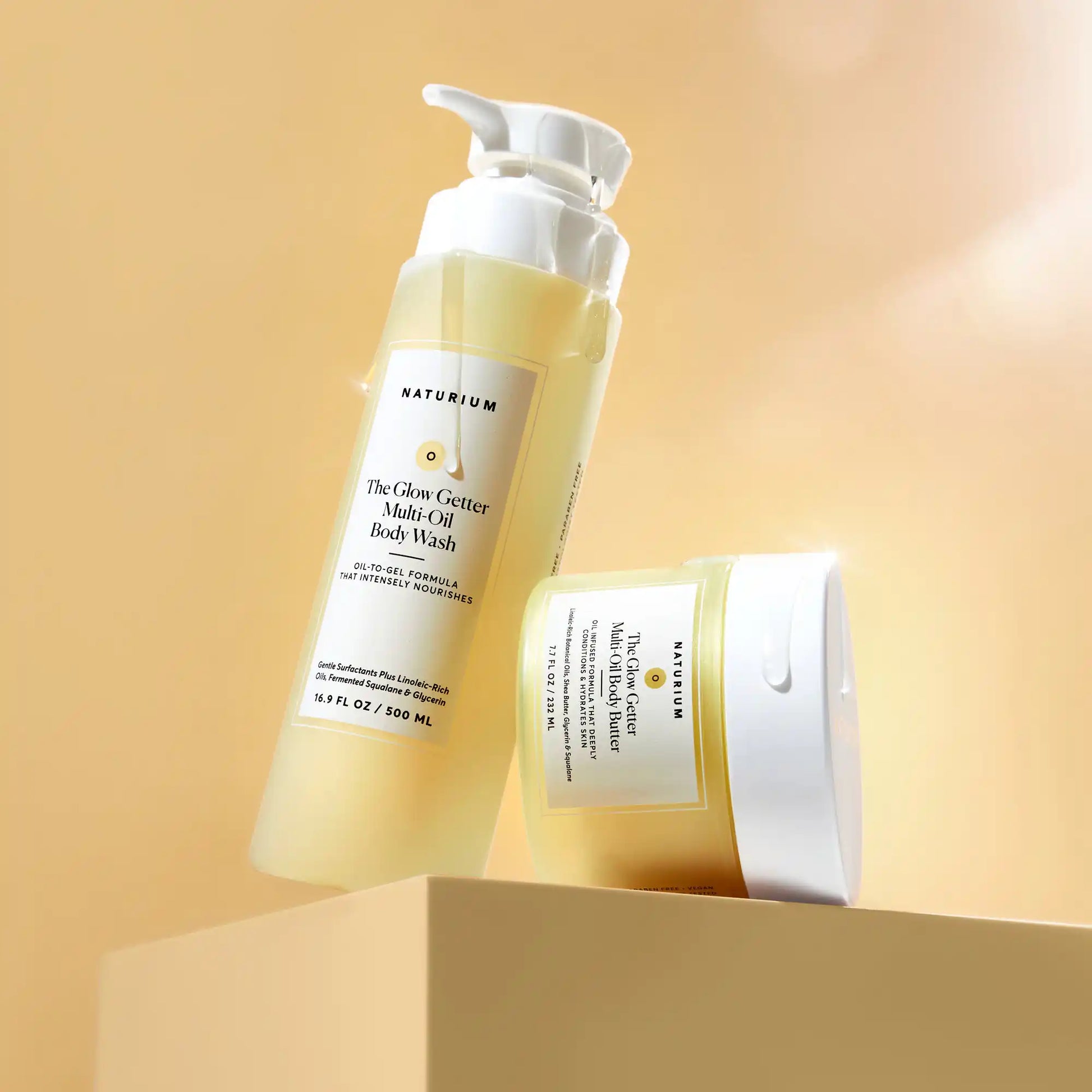 the-glow-all-out-body-bundle-w9 gg-bodybutter_1464-crop_revcolor_FL.webp